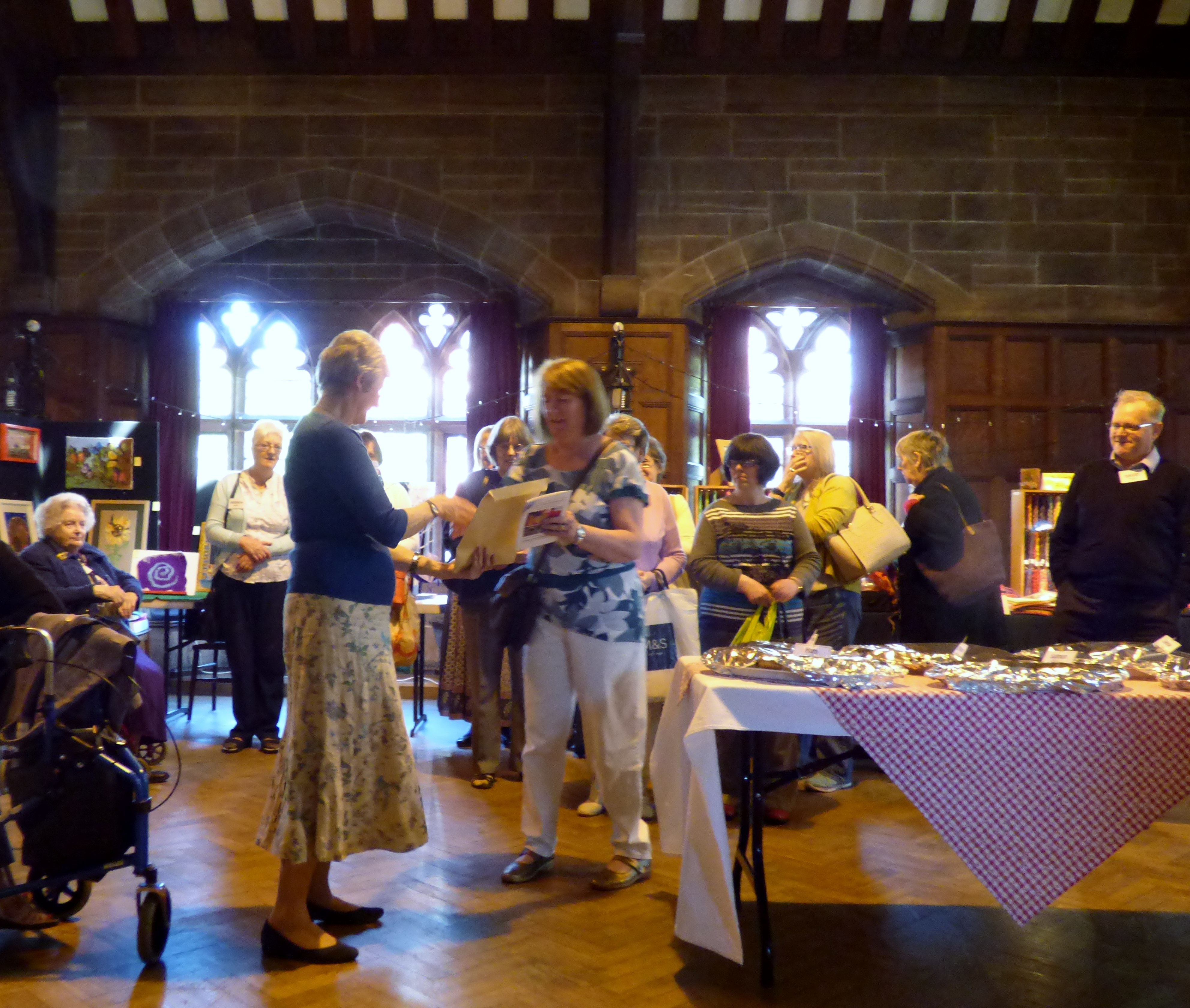 Jean Critchley is presented with her 25 year badge at MEG Summer Tea Party 2016