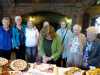 Norma, who has been a MEG member for 40 years, cuts the "25 Years Plus and Counting" cake at 2014 September Tea Party