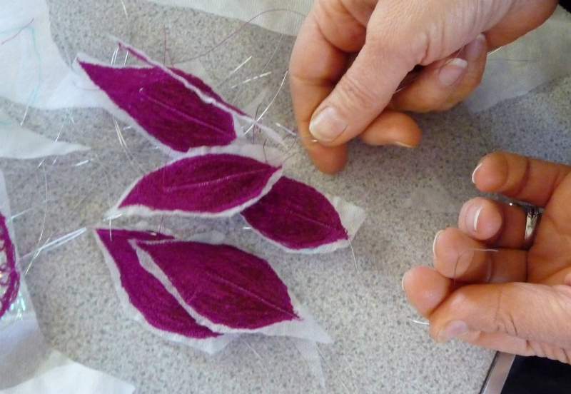 the  petals are cut out and need to be soaked in cold water to remove the solufleece