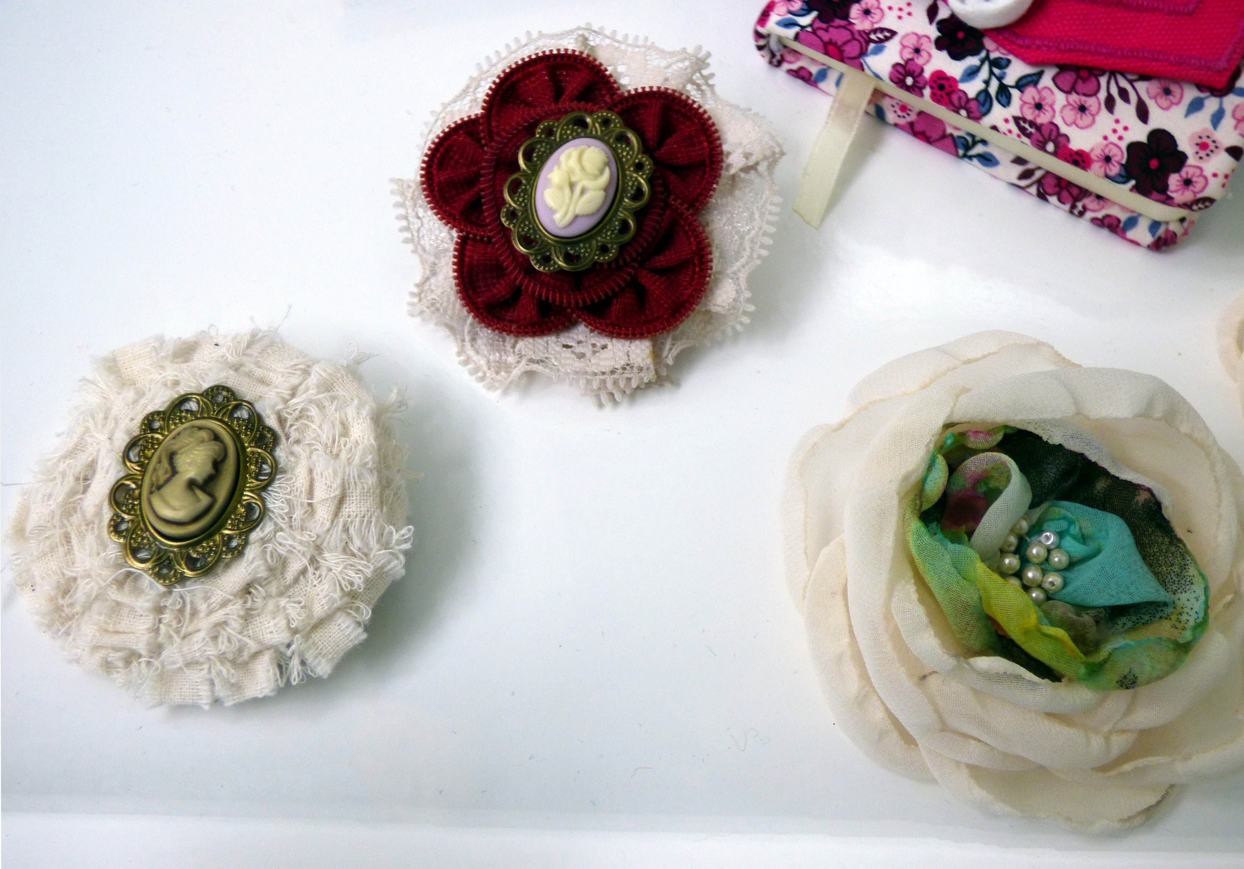 FABRIC BROOCHES by Tina Leahey, recycled textiles, CRAFTED exhibition, Huyton Gallery, 2016