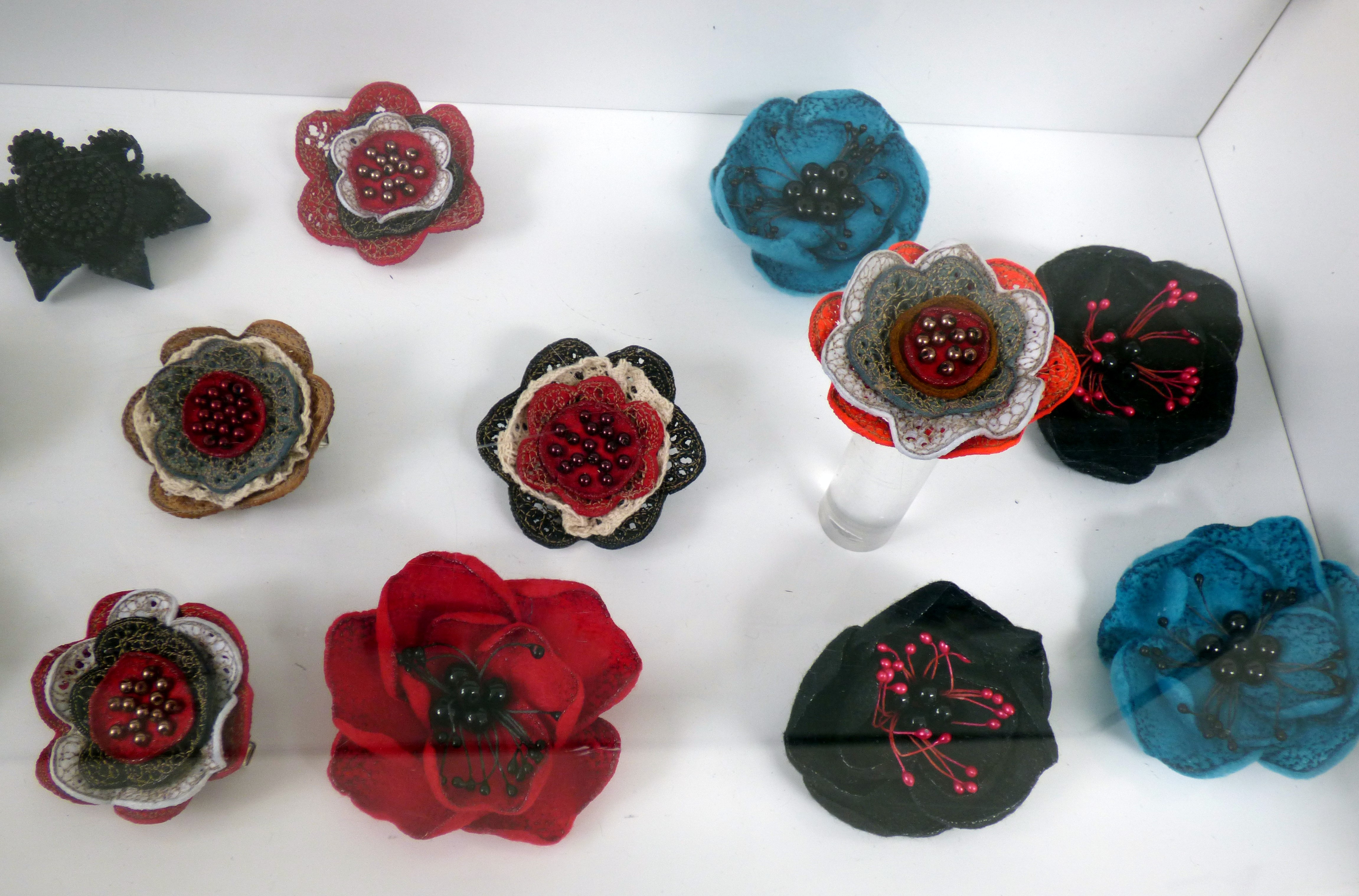 FABRIC BROOCHES by Tina Leahey, recycled textiles, CRAFTED exhibition, Huyton Gallery, 2016