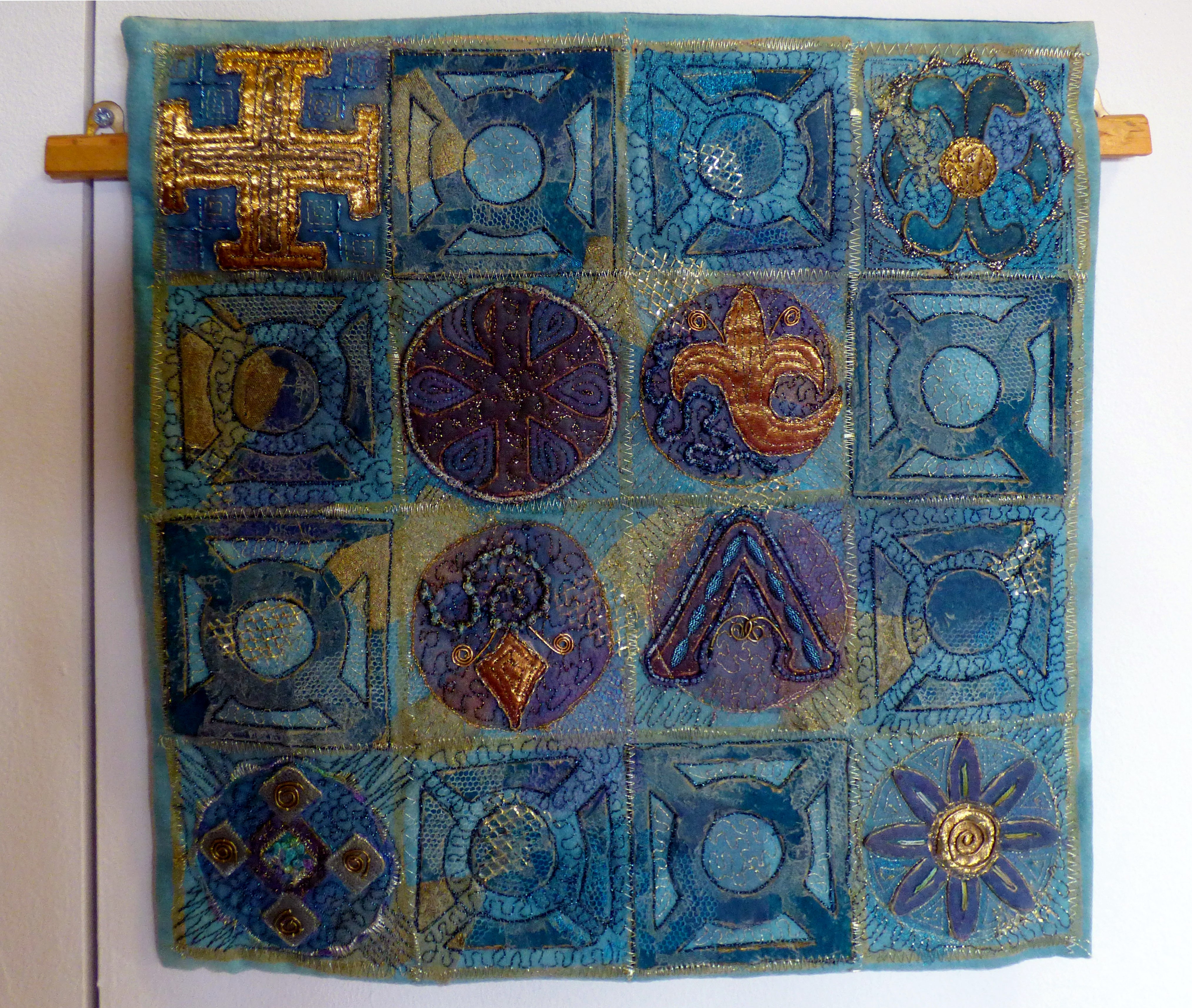 GETHSEMANE by Hilary Kimber, pieced & bonded fabrics with machine & hand stitching. Design based on the gates of the Church of All Nations, Jerusalem