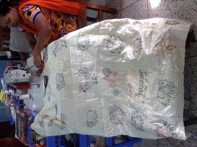 this is a new embroidered Sreepur quilt being assembled. It will be raffled to add to the Sreepur charity funds
