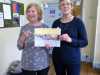 Norma Heron is presented with her 5o year gold badge by MEG Chair Kim Parkman