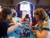 Sophie is demonstrating how to make wire butterflies at MEG Summer Tea Party 2016