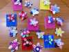 we made notebooks, hair slides and flower badges in YE Group, July 2016