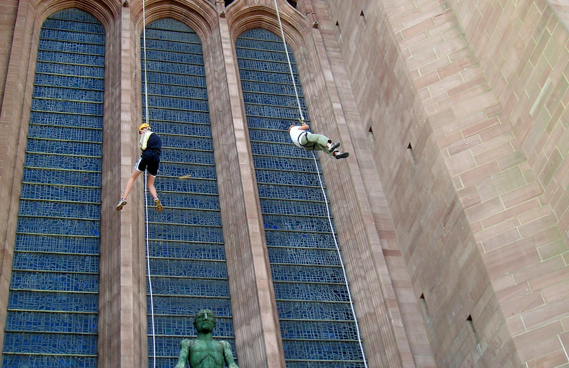 Ken Porter & his grandson Matthew Abbott abseiling down Liverpool Cathedral for Sreepur charity, Aug 2014