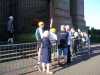 Ruby Porter waits at the bottom to greet her husband and grandson after their abseil down Liverpool Cathedral, Aug 2014 to fundraise for Sreepur charity