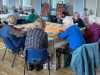 members of Merseyside Expressive Stitchers' Group chatting at October 2023 meeting