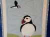 PUFFIN WALLHANGING by Lesley Tarnowski, hand embroidery on hand applique and hand quilting