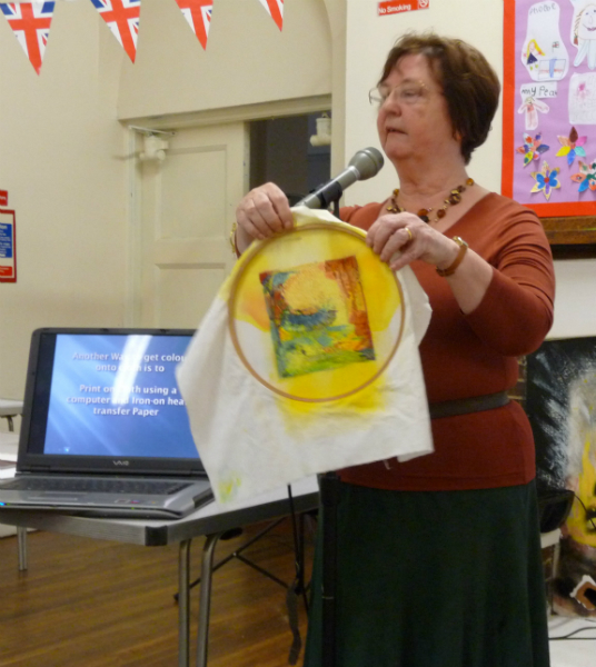 Norma Hopkins showing us a sample of an embroidery in progress