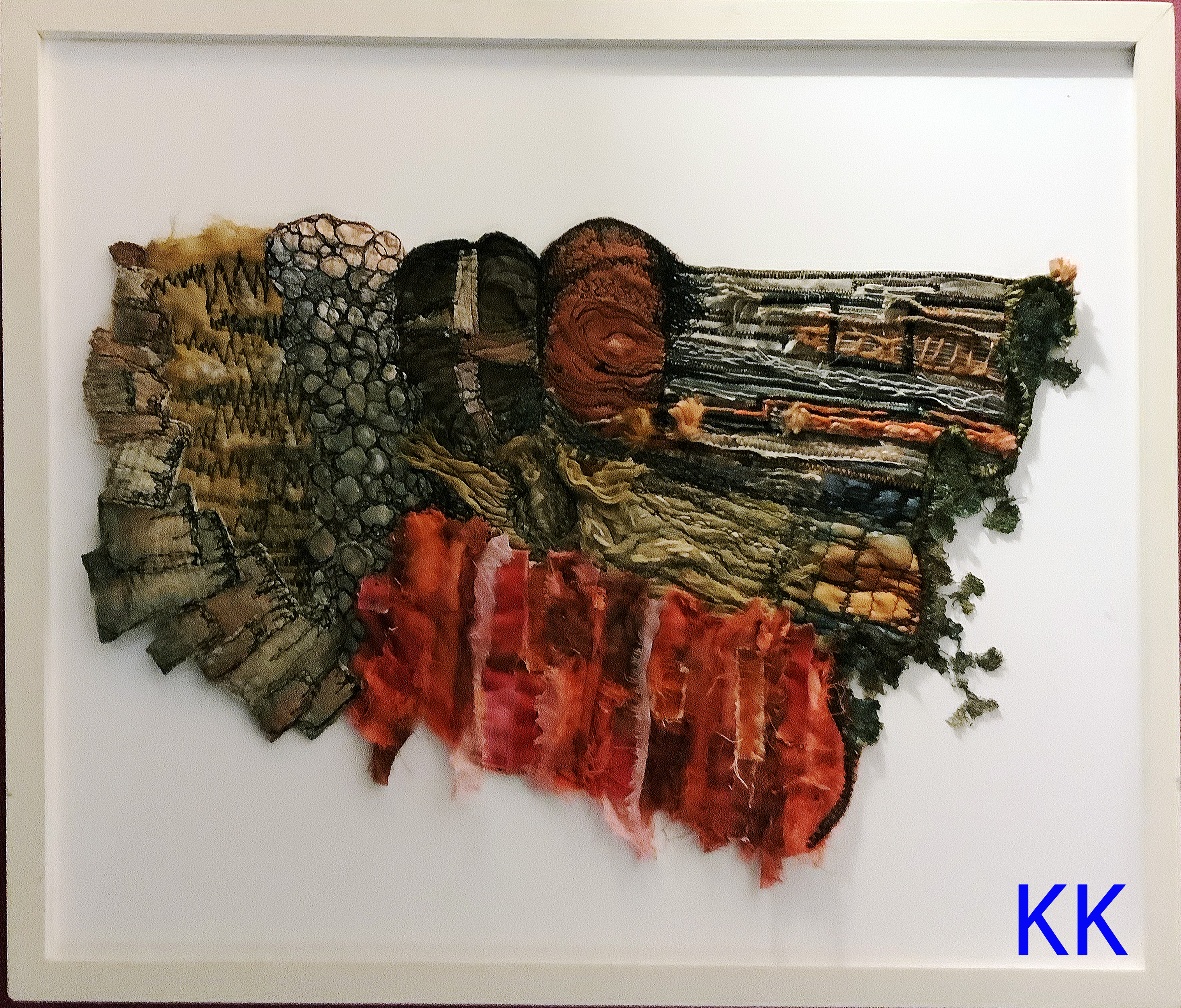 ABSTRACT SECTION OF A CLIFF FACE ANGLESEY, hand dyed fabrics with couching, appliqué, fabric manipulation with hand and free machine stitching.