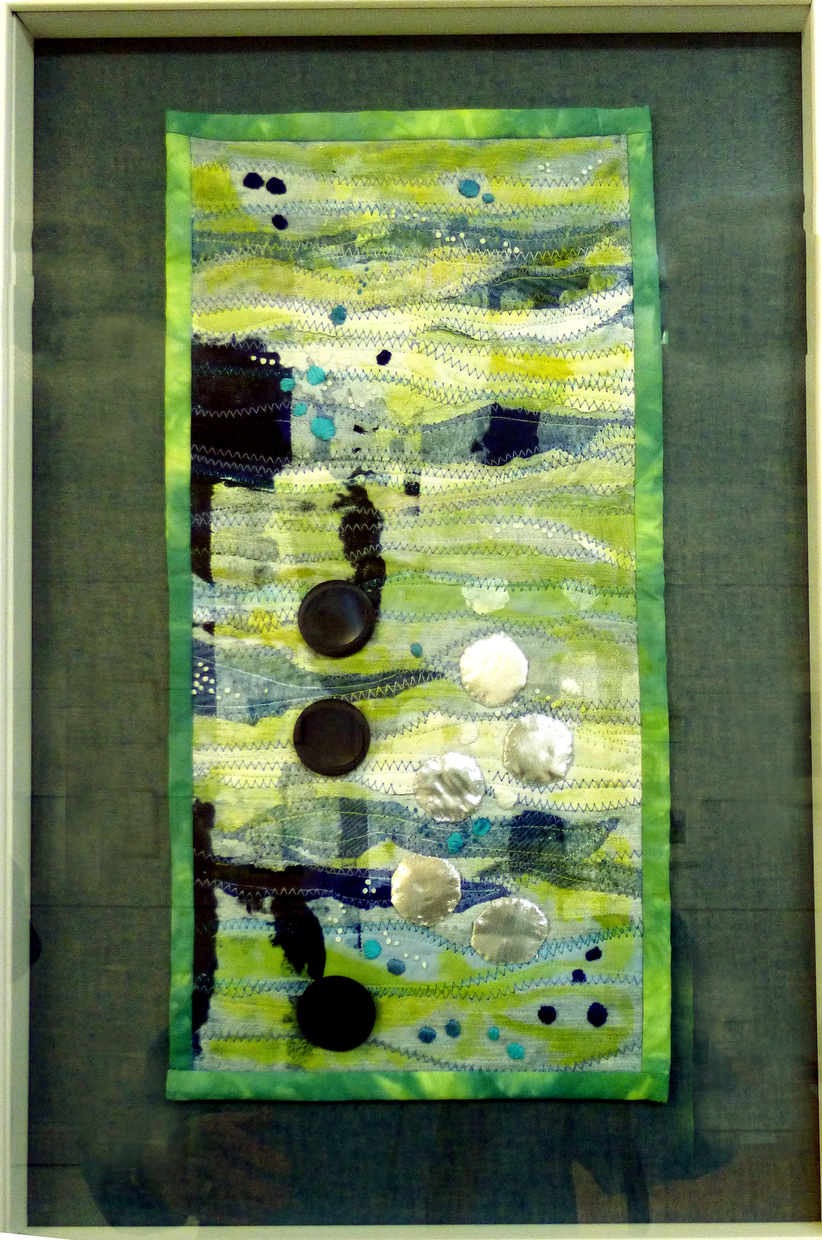 BUBBLES by Sue Boardman, fabric collage with buttons, ConText group 2018