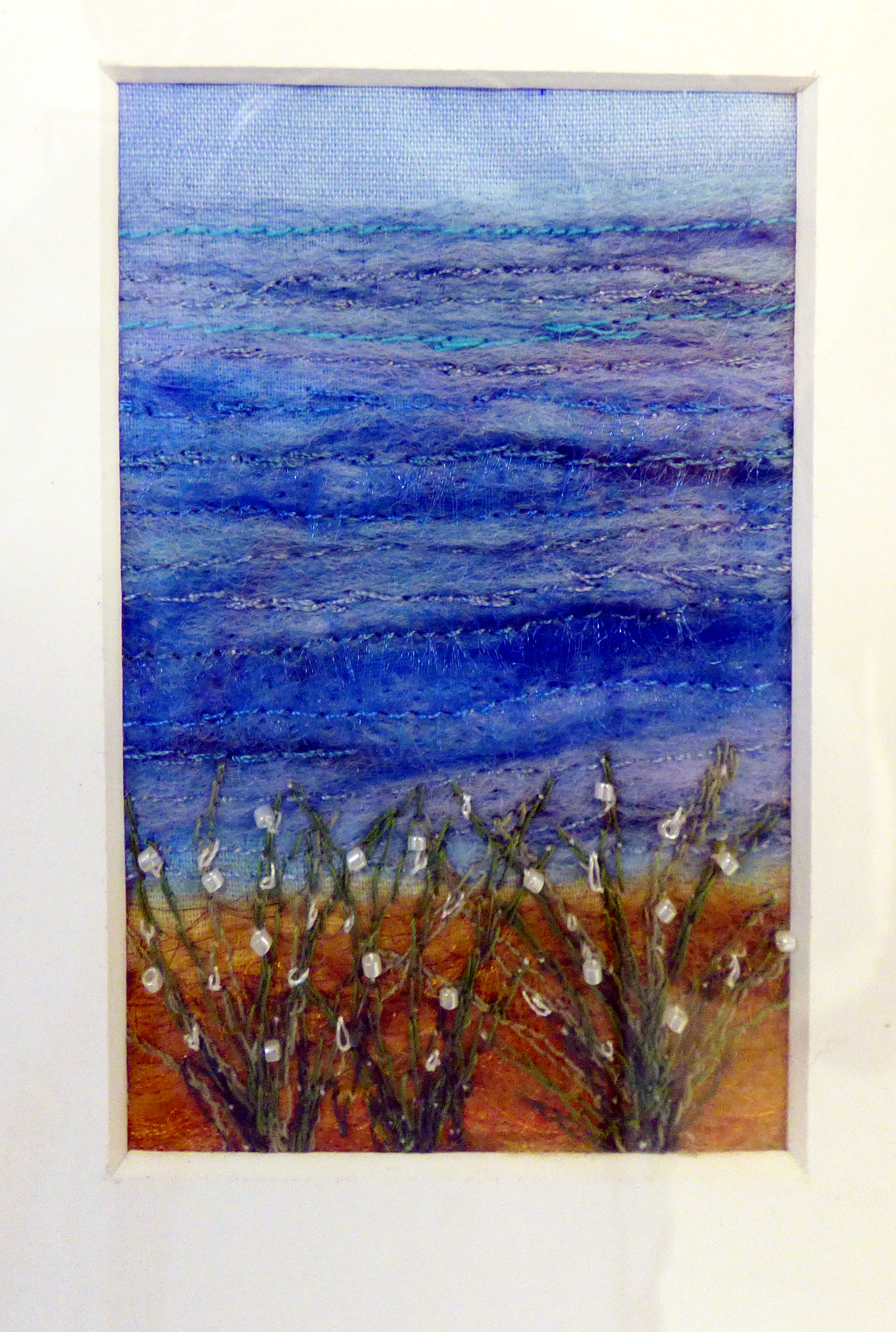 WATER'S EDGE by Joan Norton, free machine stitching on a hand felted background, ConText group 2018