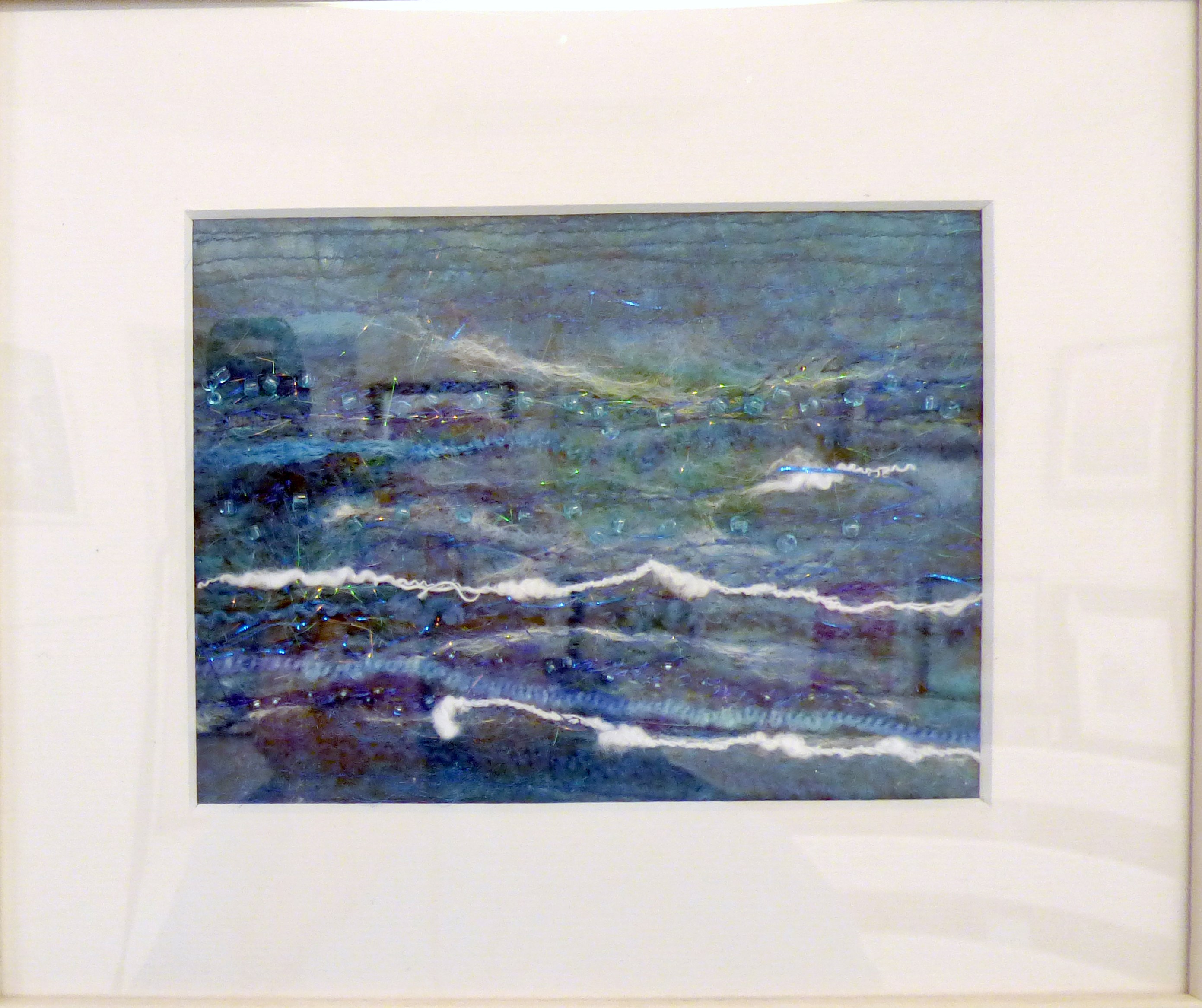 LA MER by Joan Norton, free machine stitching on a hand felted background, ConText group 2018