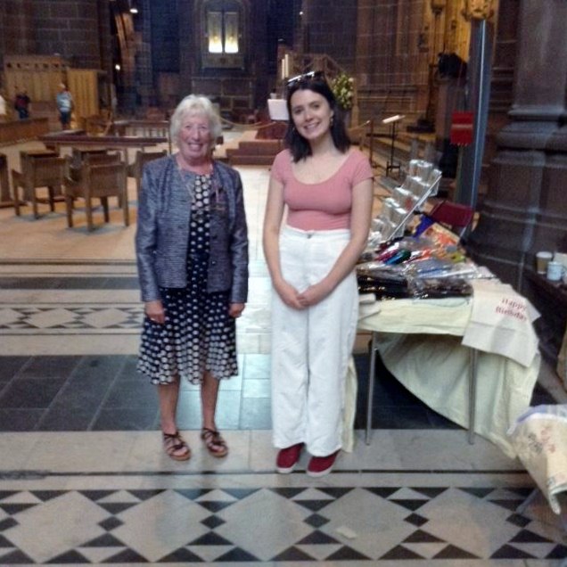 Rubina Porter MBE with her granddaughter Finni at Threading Dreams exhibition, Liverpool Cathedral, July 2018