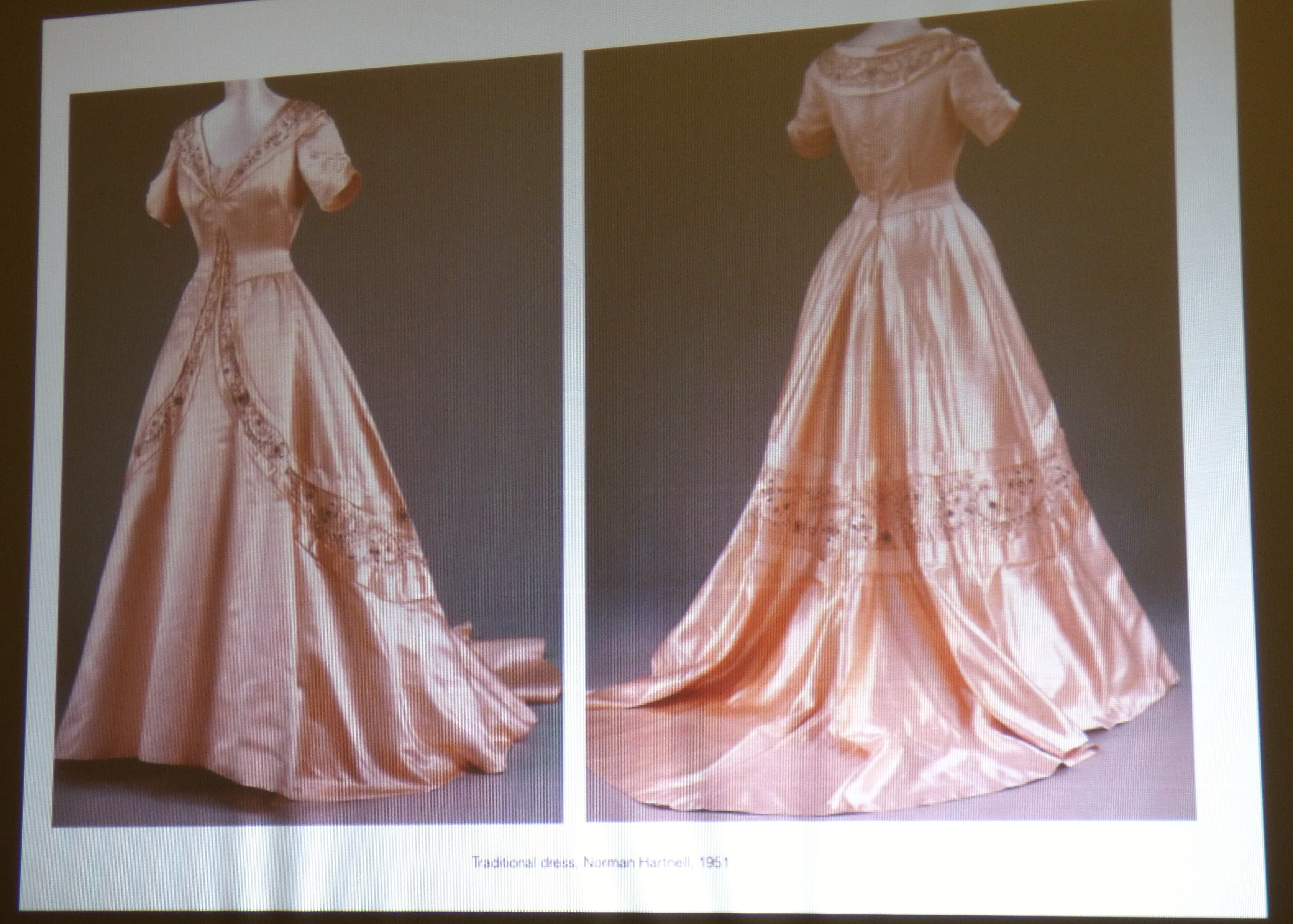 slide showing a traditional wedding dress by Norman Hartnell 1951