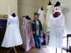 Gill Roberts surrounded by her fashion history in wedding dresses, at her "History of the Wedding Dress" Talk, MEG 2018