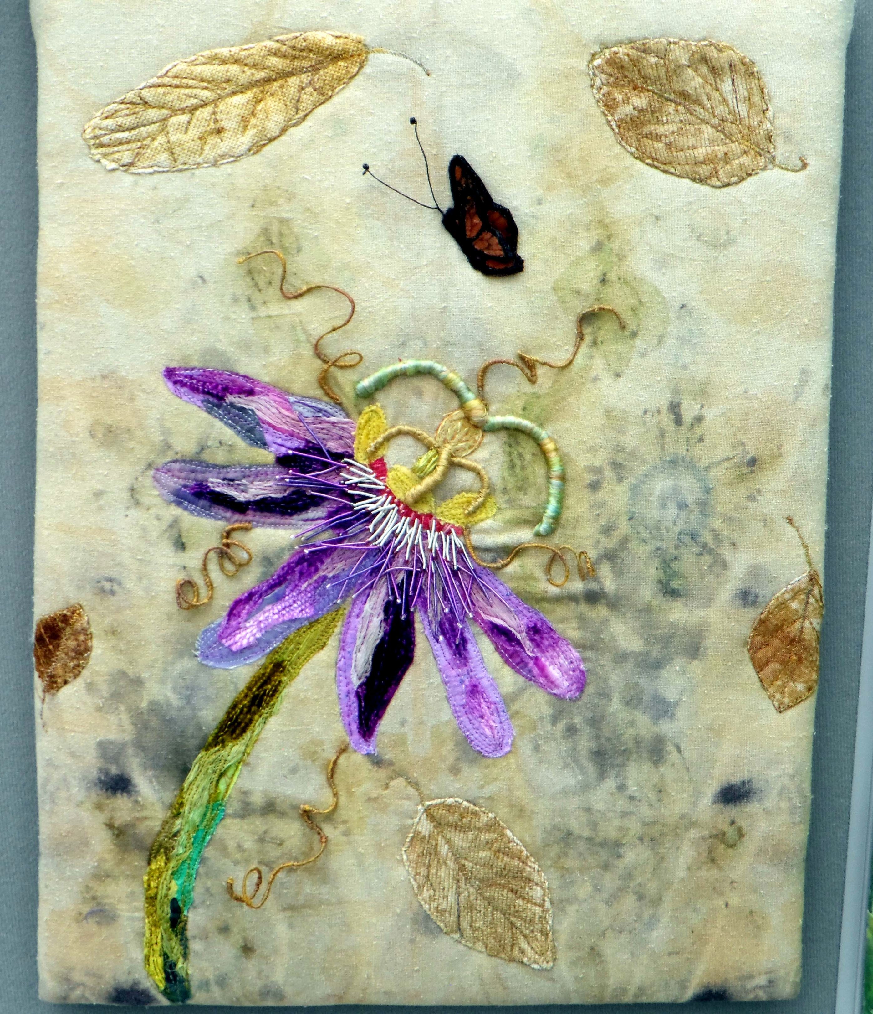 PASSIONFLOWER by Mal Ralston, ecoprinted background with hand stitch, beading and wiring, Contemporary Threads exhibition, Sefton Palm House, Feb 2022
