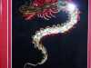 DRAGON by Dianne Thomas, goldwork with leather
