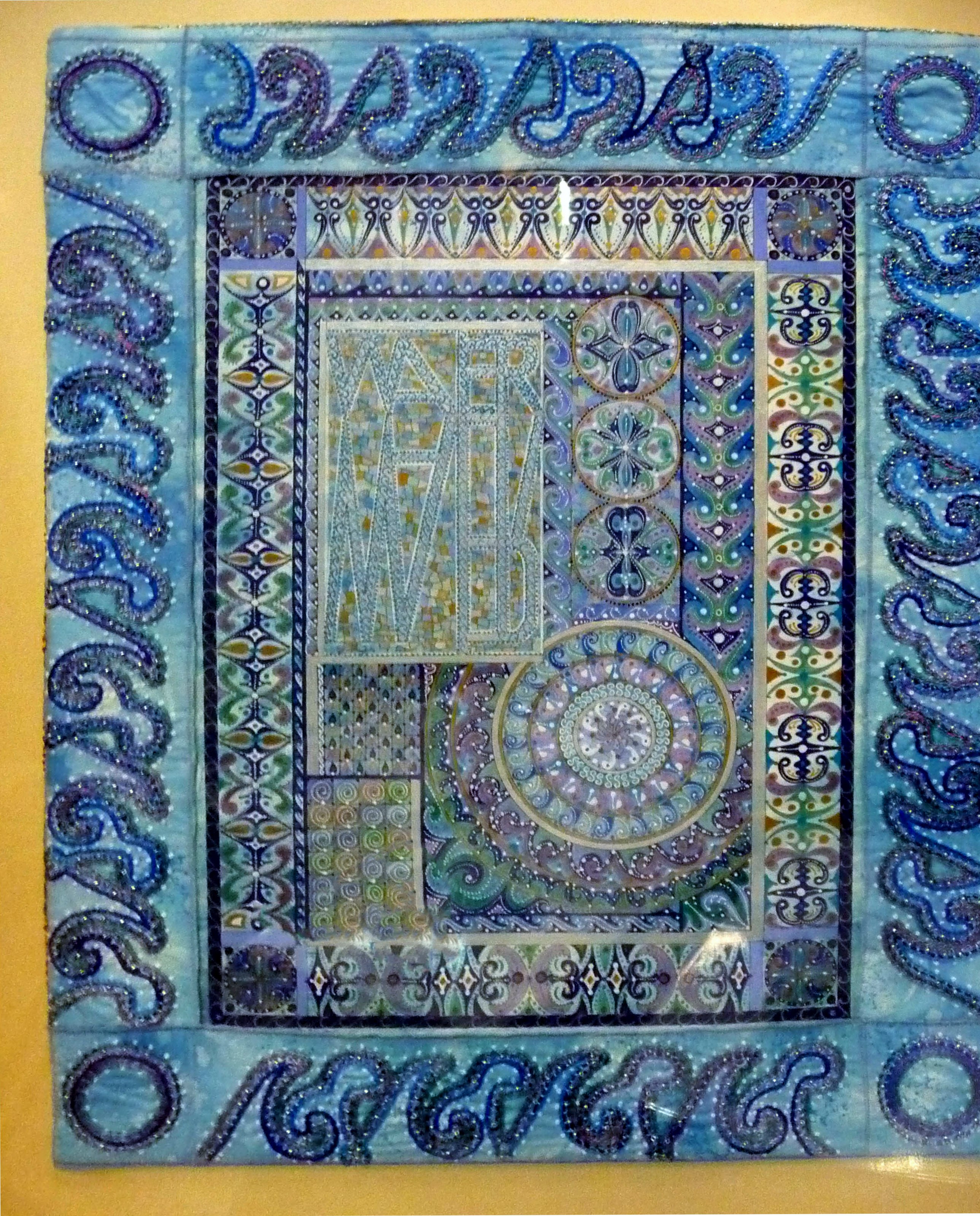 CREATION: A CELEBRATION by Sue Symonds, CARPET PAGE: WATER , painting with embroidered frame