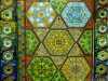 CREATION: A CELEBRATION by Sue Symonds, CARPET PAGE: CREATION MEDLEY (double spread) , painting with embroidered frame