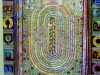 CREATION: A CELEBRATION by Sue Symonds, CARPET PAGE: LANGUAGE , painting with embroidered frame