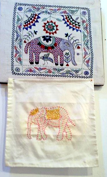 some embroidered elephants for Ruby's latest raffle quilt among the Threading Dreams exhibition, Calderstones 2017