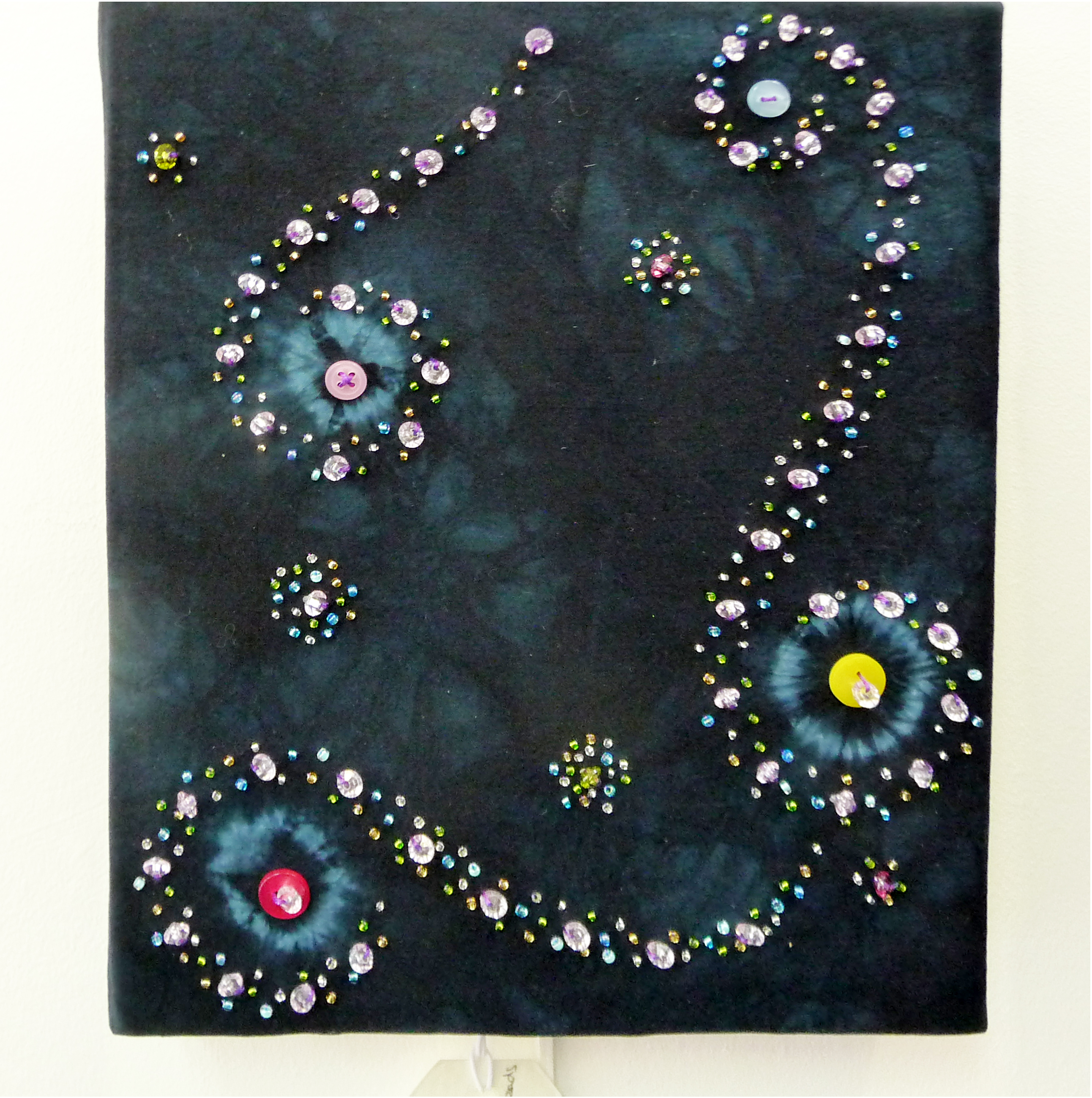 PLANETARY FORCE by Suzanne Snape, tie dyed fabric, buttons and beads
