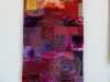 RED HOT SPIRAL GALAXY by Eileen Norris, quilted wall hanging