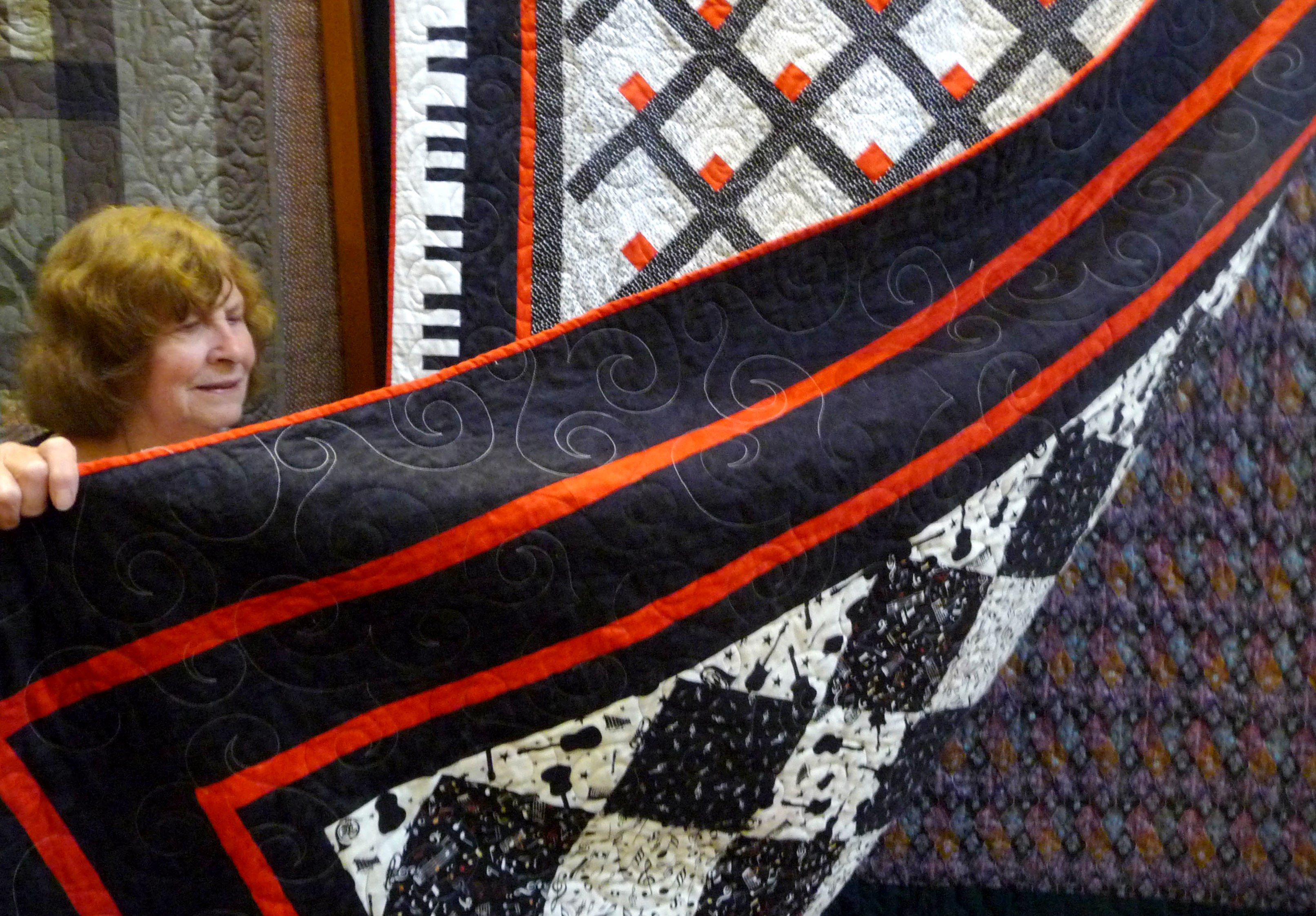 Norma shows us a double sided quilt by Yvonne Davies, Allerton Piecemakers Group