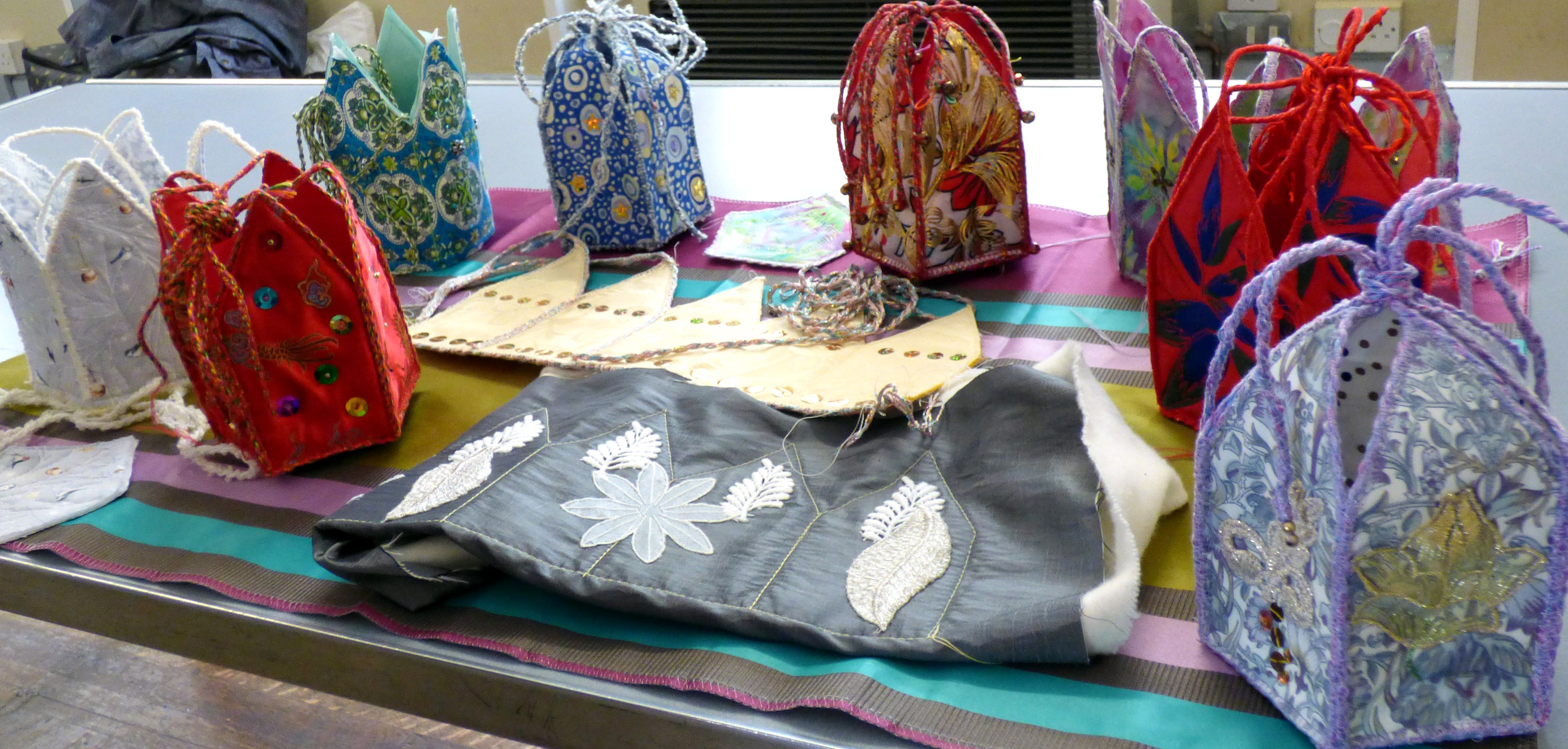 students work at 5 sided casket workshop, July 2019