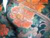 inspiration slide showing a tattooed torso, Kaffe Fassett Lecture, Capstone Theatre, Dec 2016