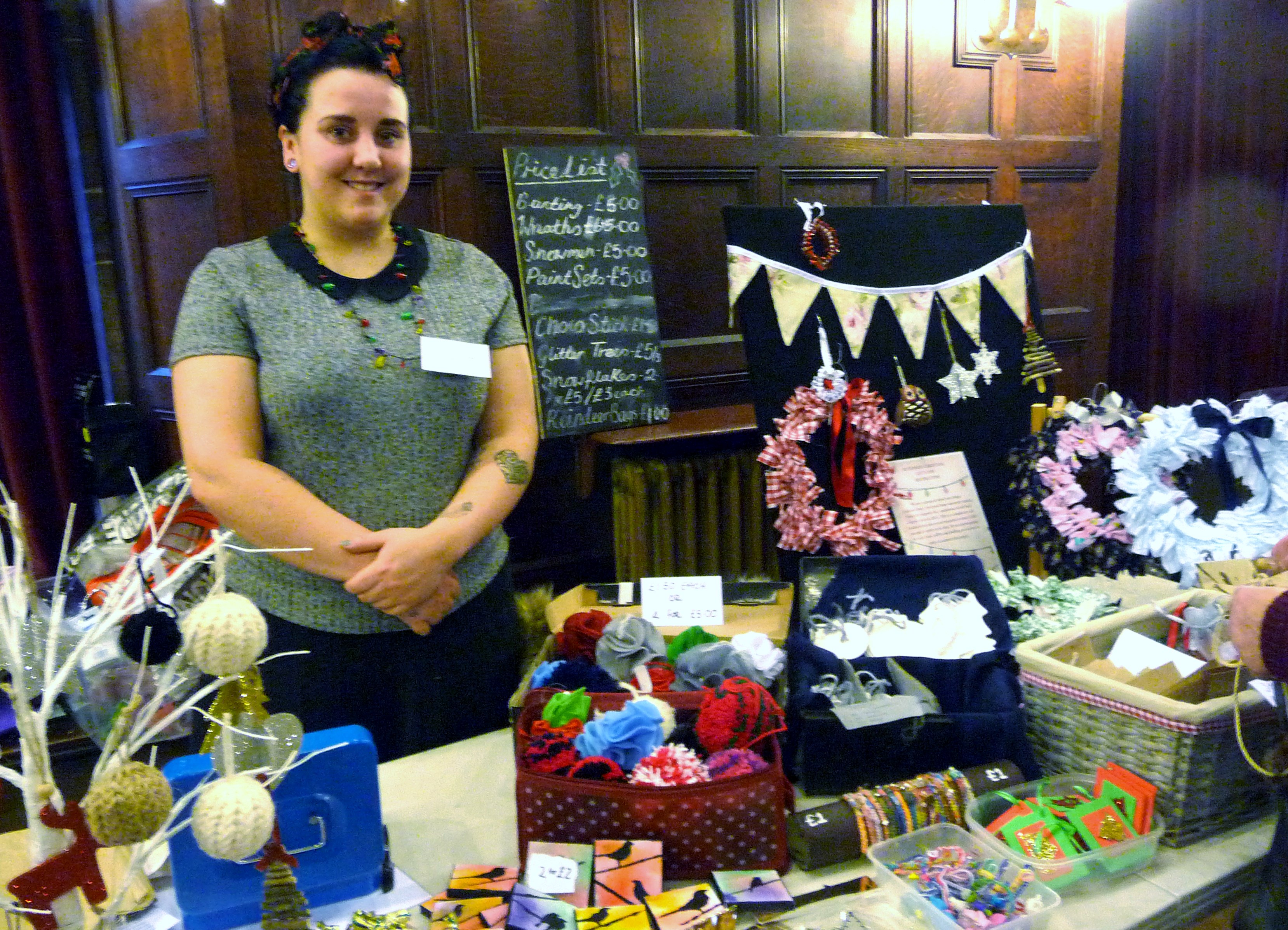 MEG Christmas Party 2015- Melissa Courtney with her stall to support Hope University Design students Final Degree Show