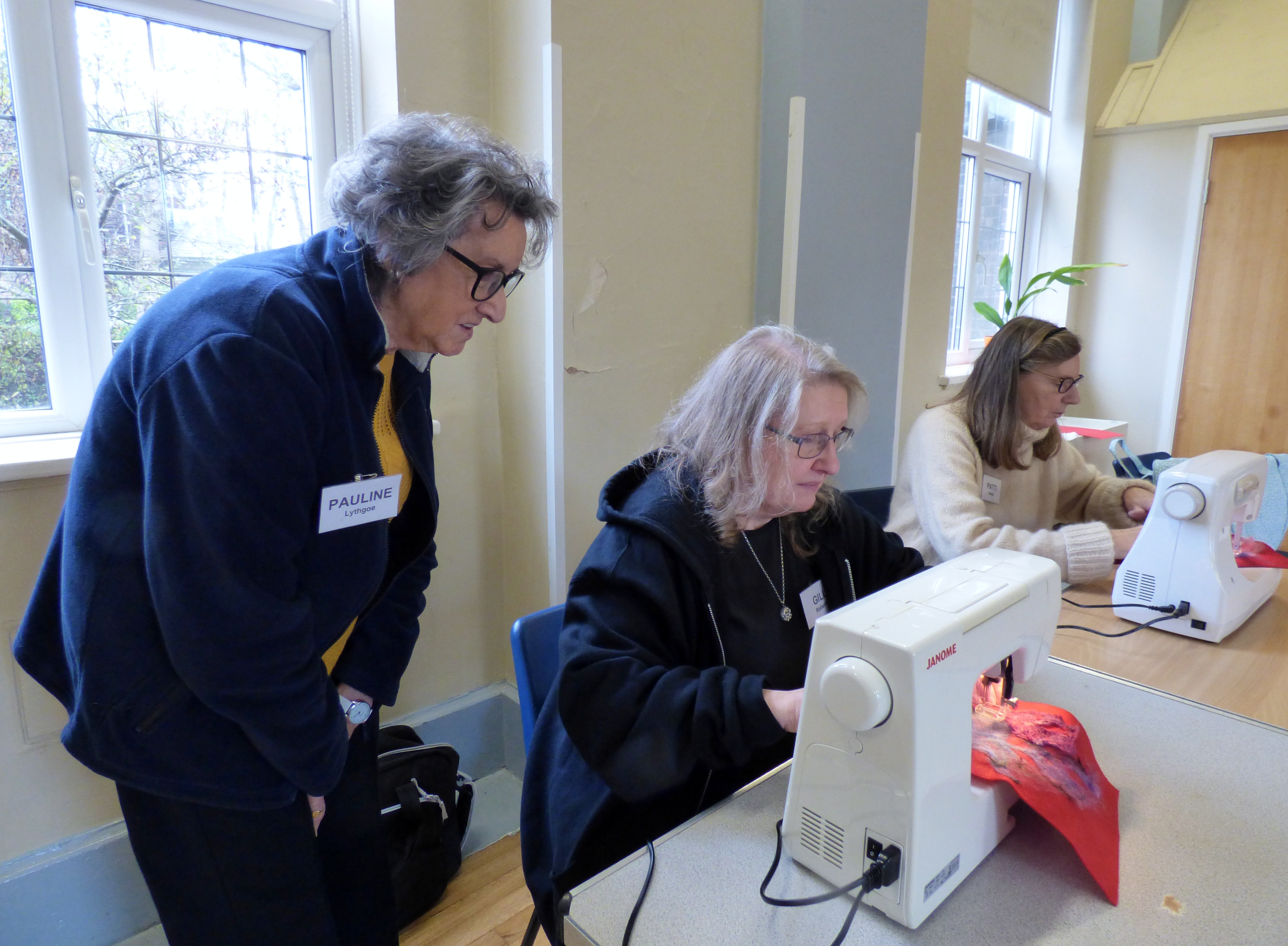 Gill Roberts demonstrating the embellishing machine at Layers, Texturing and Stitch workshop by Gill Roberts 2022