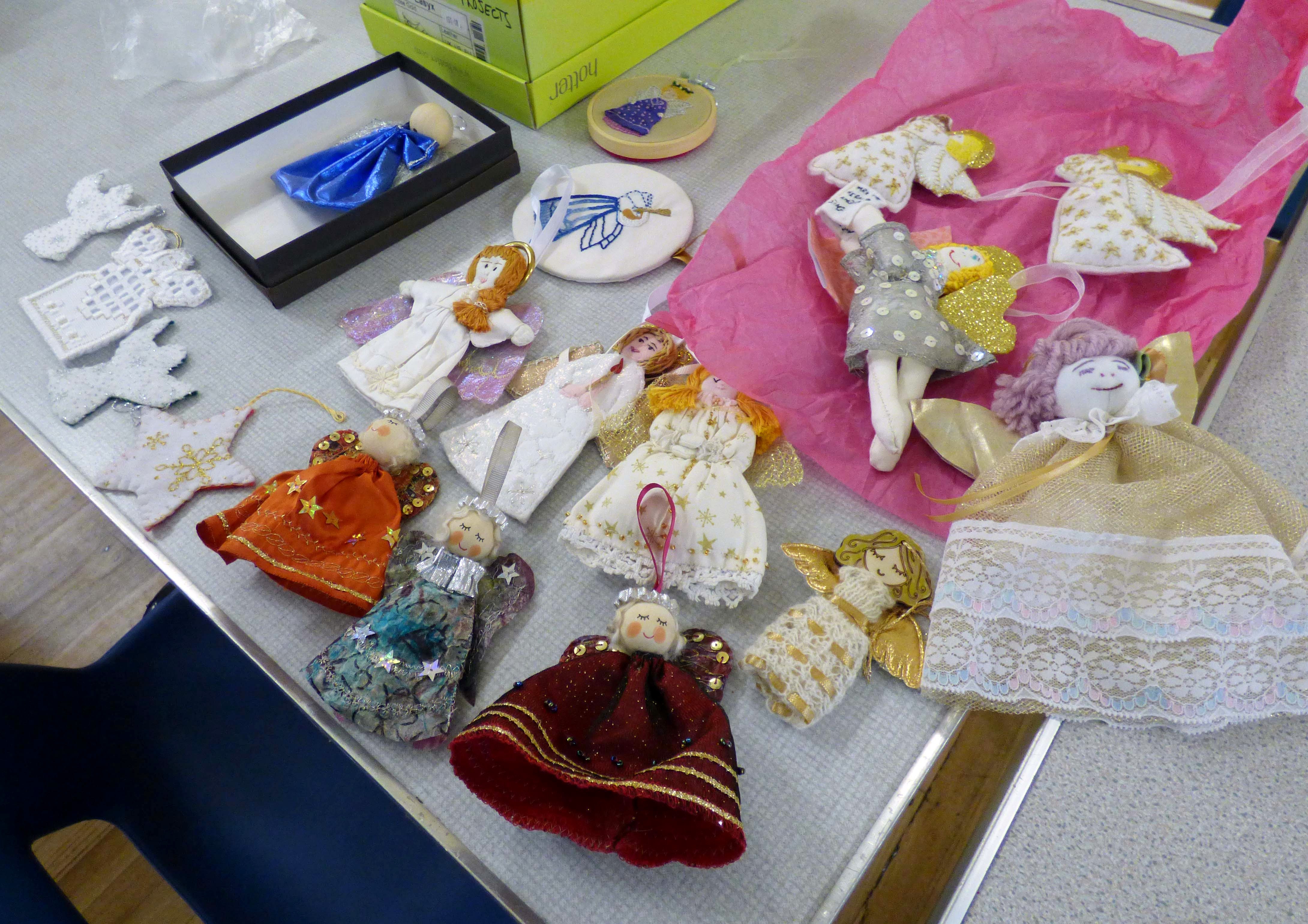 display of fabric angels made for All Hallows church Christmas display by MEsG members