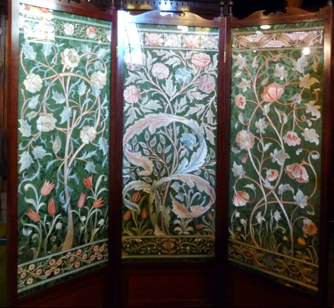 Embroidered screen by Leek School of Embroidery in St Edward the