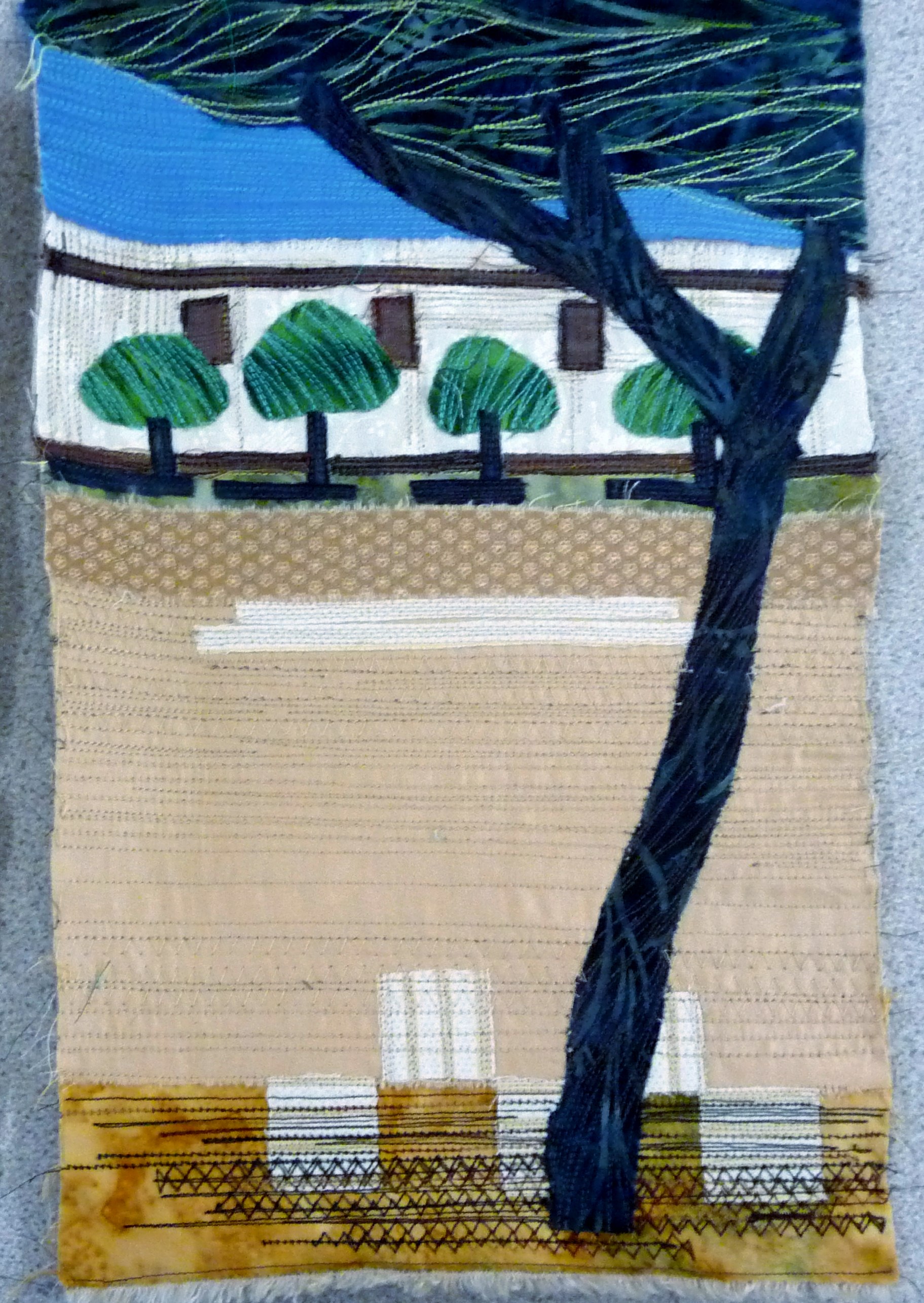applique sample with machine embroidery by Norma Heron