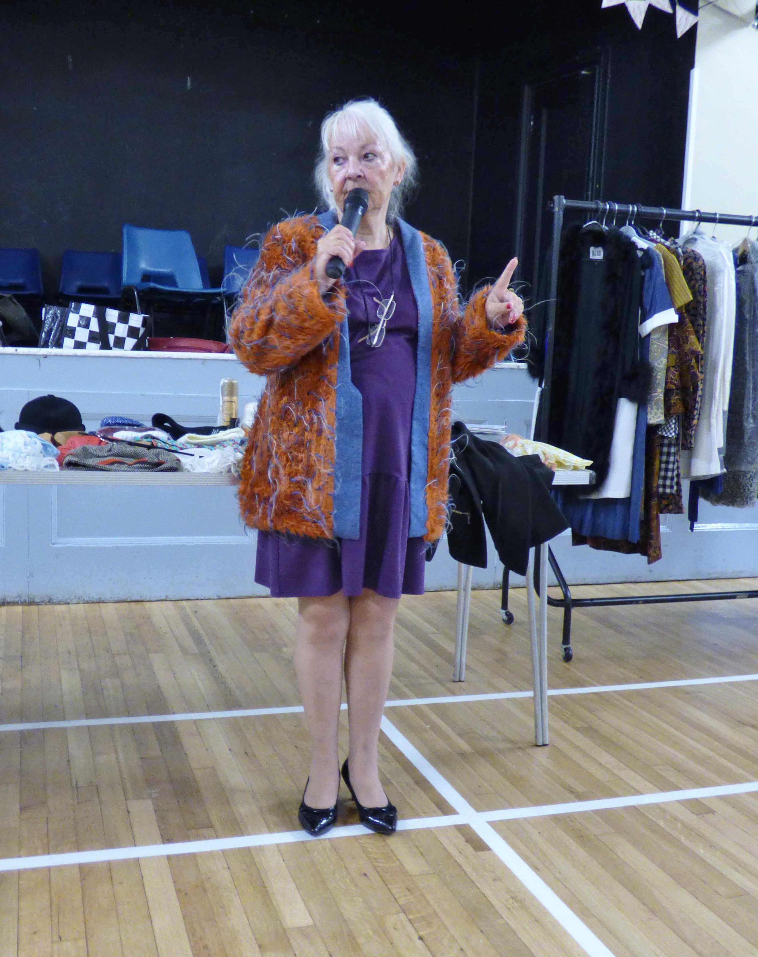 Ruth Lowe wearing a jacket designed by Mary Quant and previously worn by John Lennon at "Mary Quant Talk" by Ruth Lowe, 2022