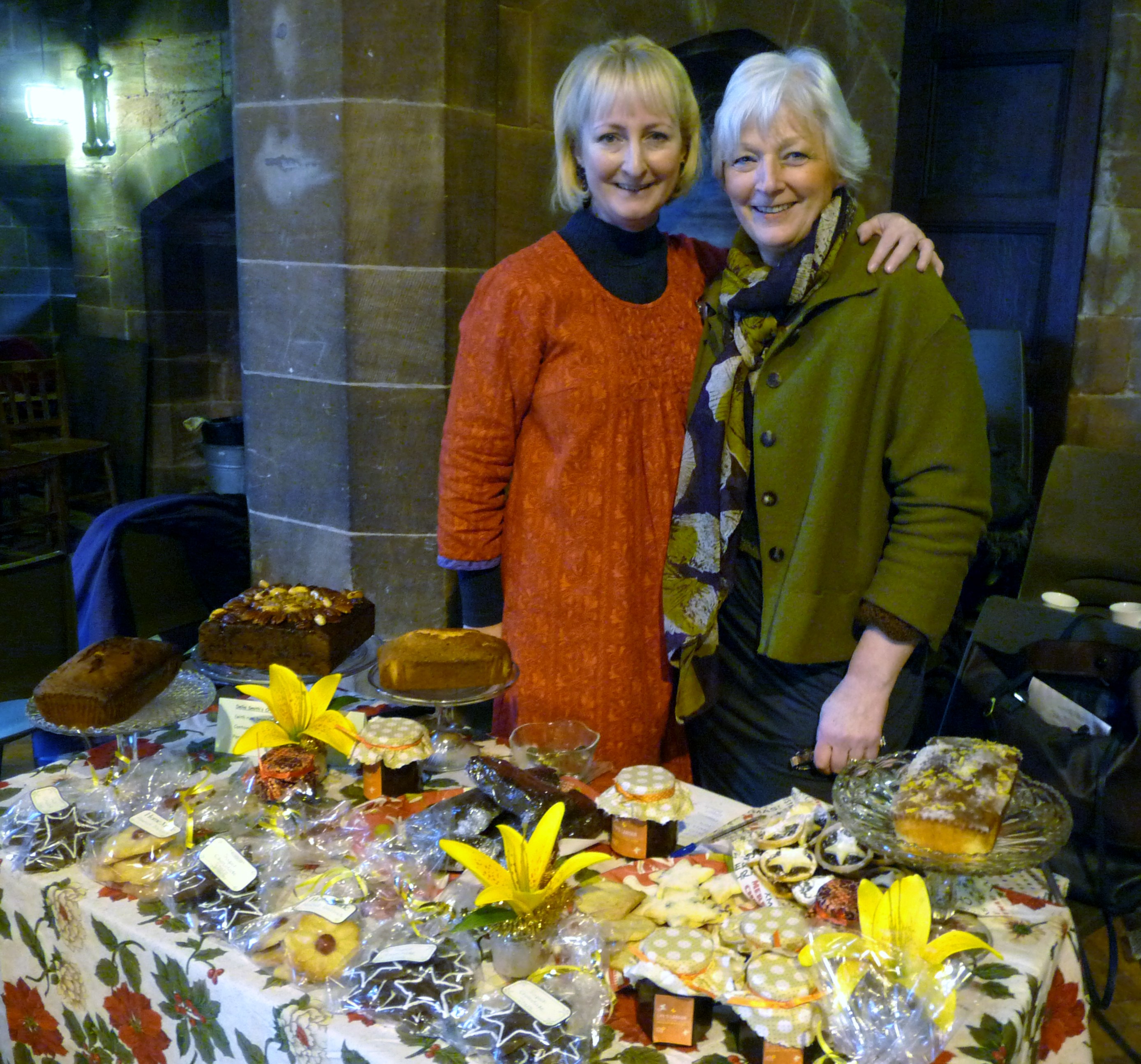 Sarah and Carolyn with the Homemade Cake stall at MEG Christmas Party 2014