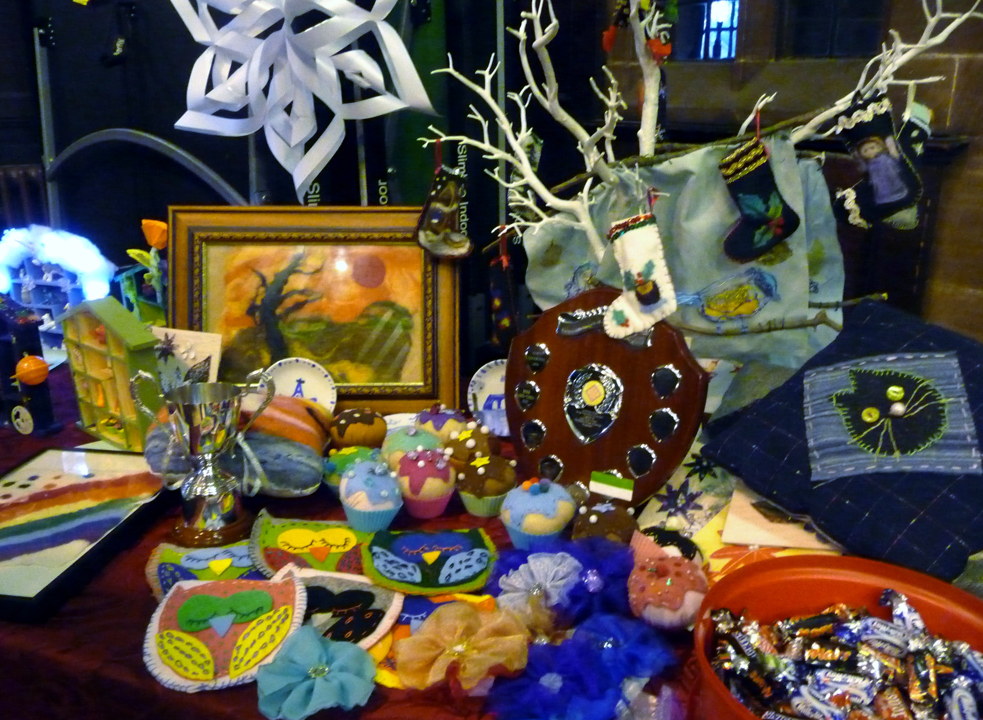 YE display of work and the Cup and Sreepur Shield which is presented to Merseyside Young Embroiderer of the Year