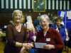 Hilary McCormack, winner of Traditional Embroidery competition 2014, receiving her prize from MEG Chair Kim Parkman at MEG Christmas party 2014