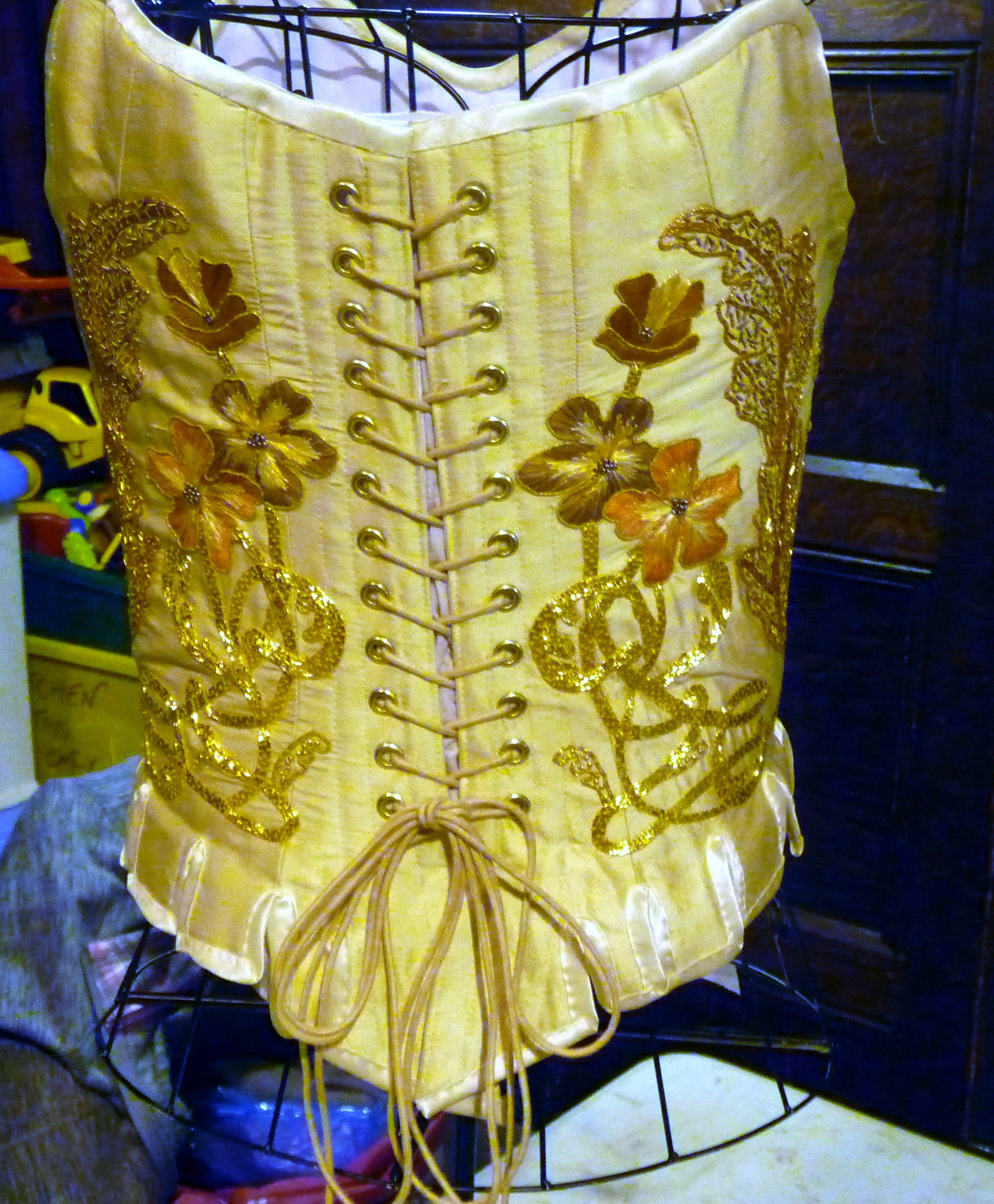 MEG Christmas Party 2015- back view of the winning entry to the Traditional Embroidery competition. Goldwork corset by Gill Roberts