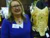 MEG Christmas Party 2015- Gill Roberts with her goldwork corset which won First Prize in the Traditional Embroidery competition