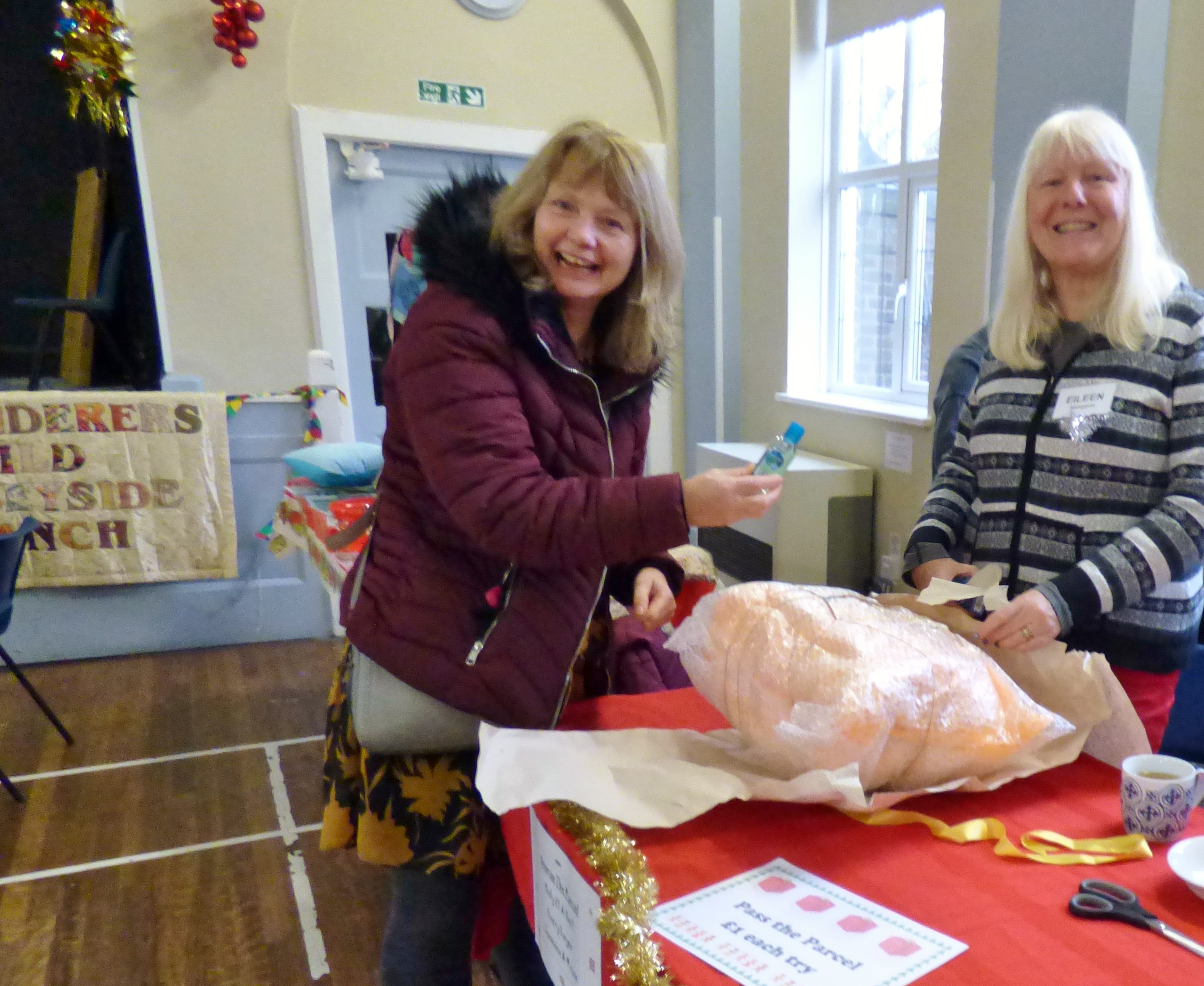 Liz and Eileen with "Pass the Parcel" at MEG Christmas Party 2019