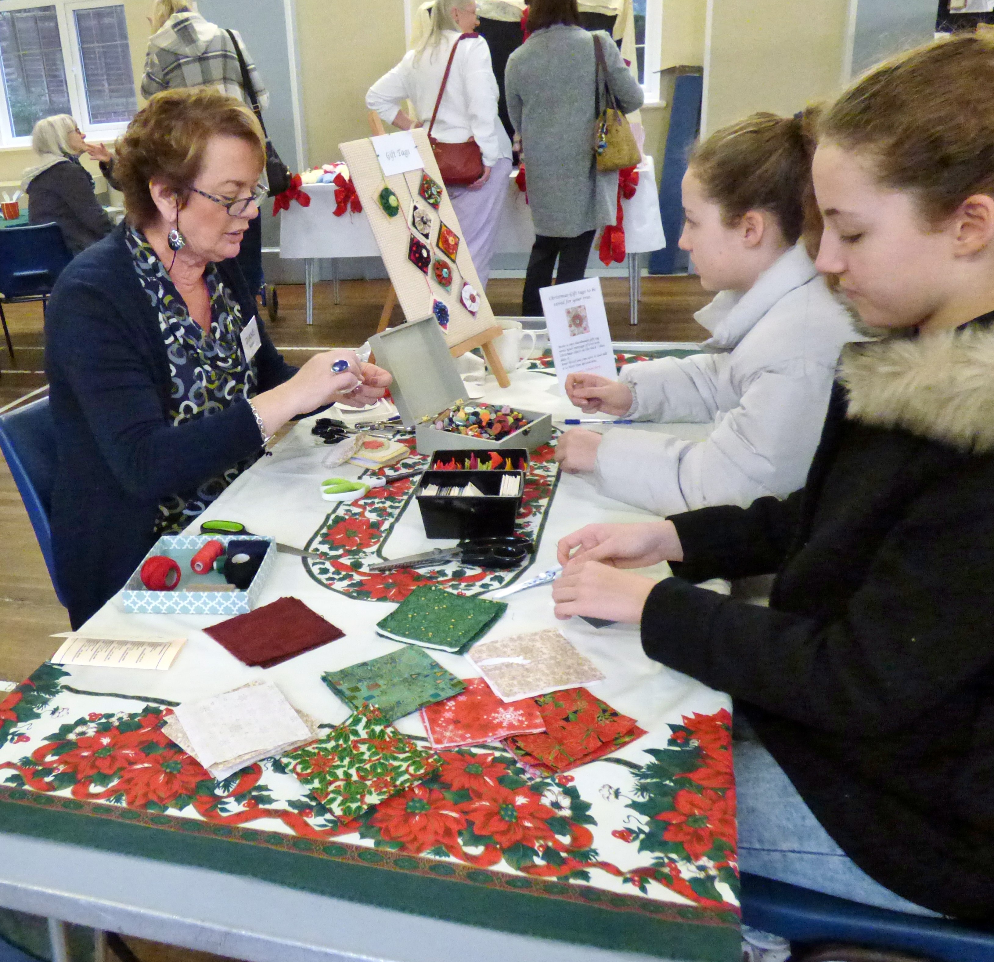 Diana with "Make a Gift Tag" activity at MEG Christmas Party 2019