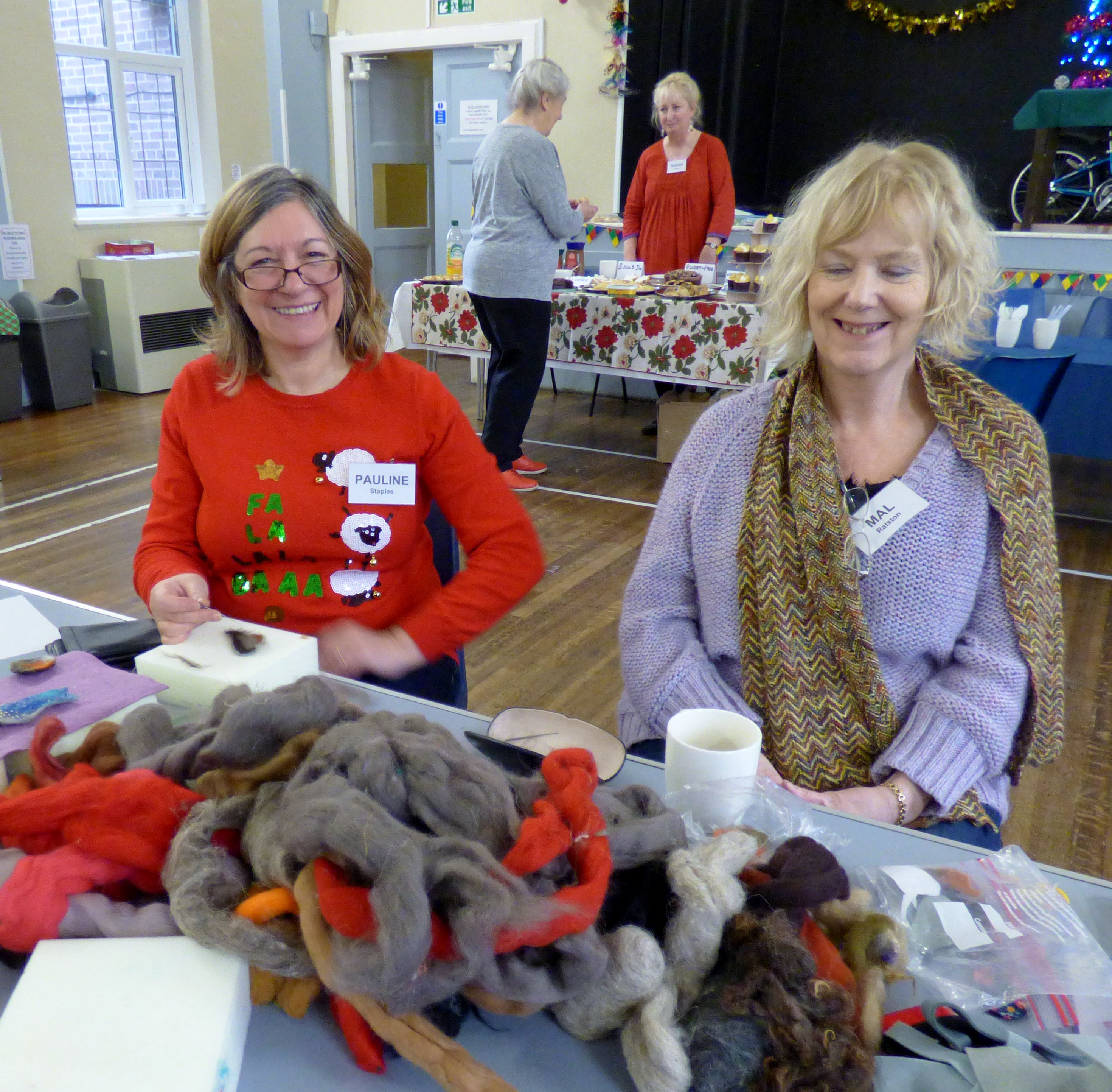 Pauline and Mal with "Make a Needlefelted Robin" activity at MEG Christmas Party 2019