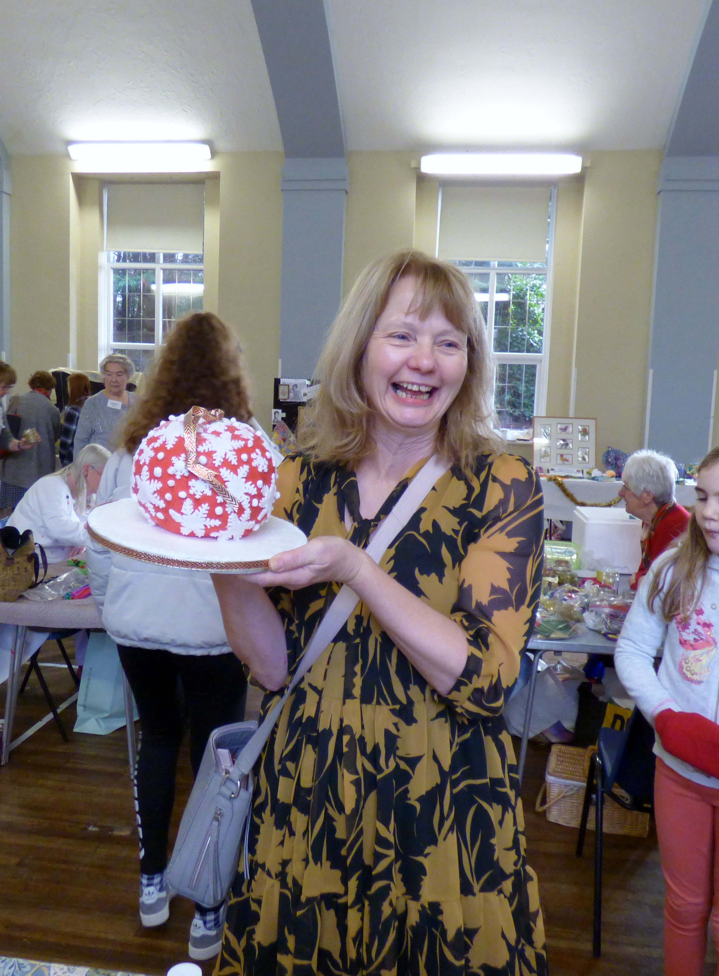 Liz won a wonderful Christmas cake on the Tombola at MEG Christmas Party 2019