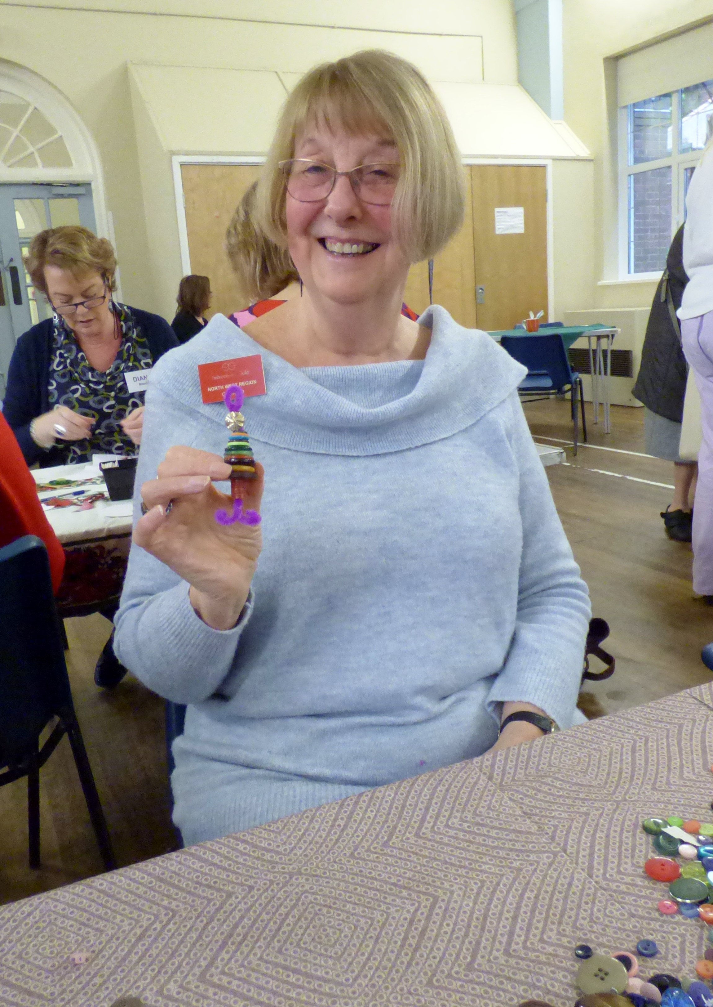 NW Regional Chair Sue Chisnall was pleased to make a button Christmas decoration at MEG Christmas Party 2019