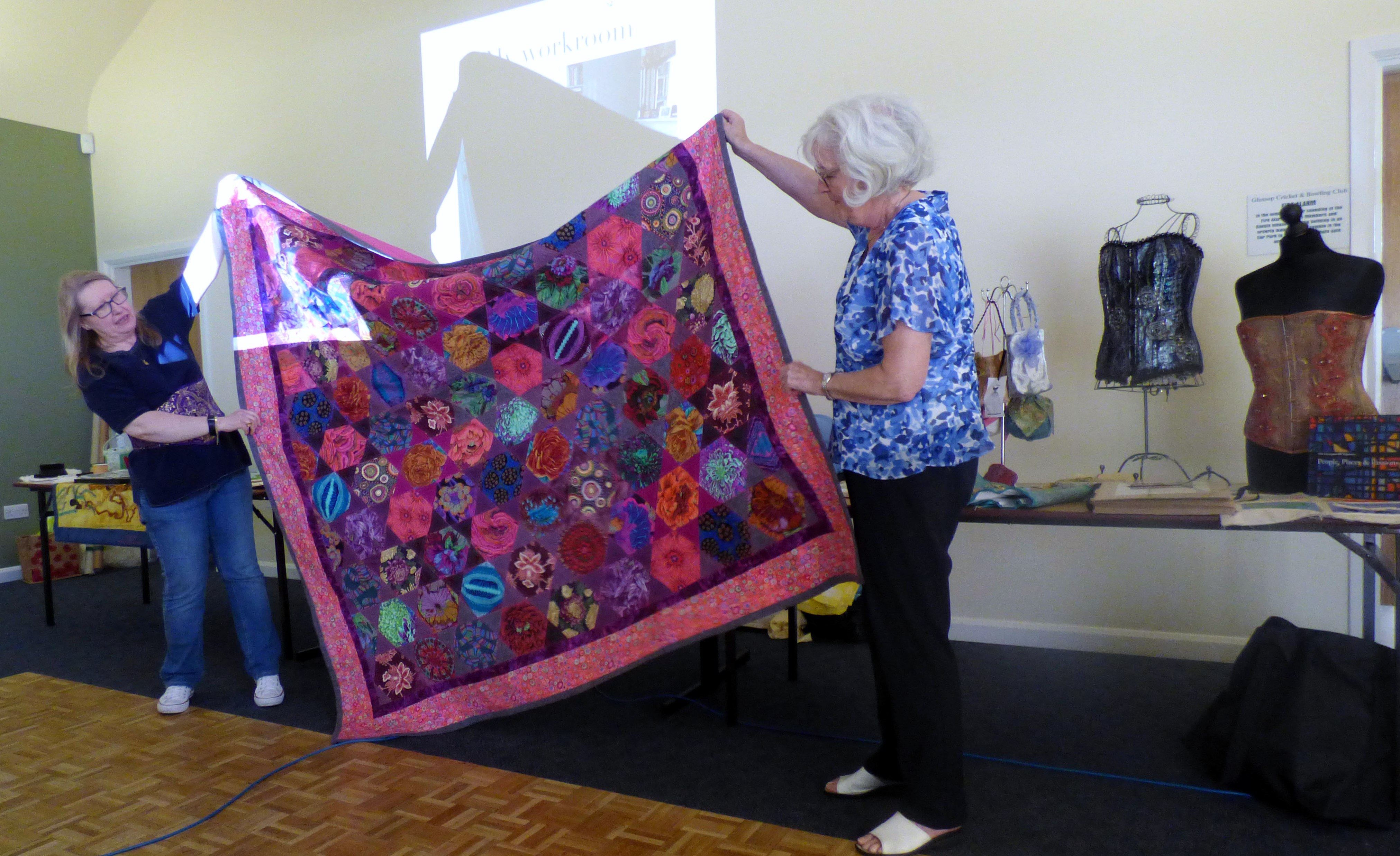 Gill Roberts & Elsie Watkins with Gill's quilt made following a Kaffe Fassett workshop